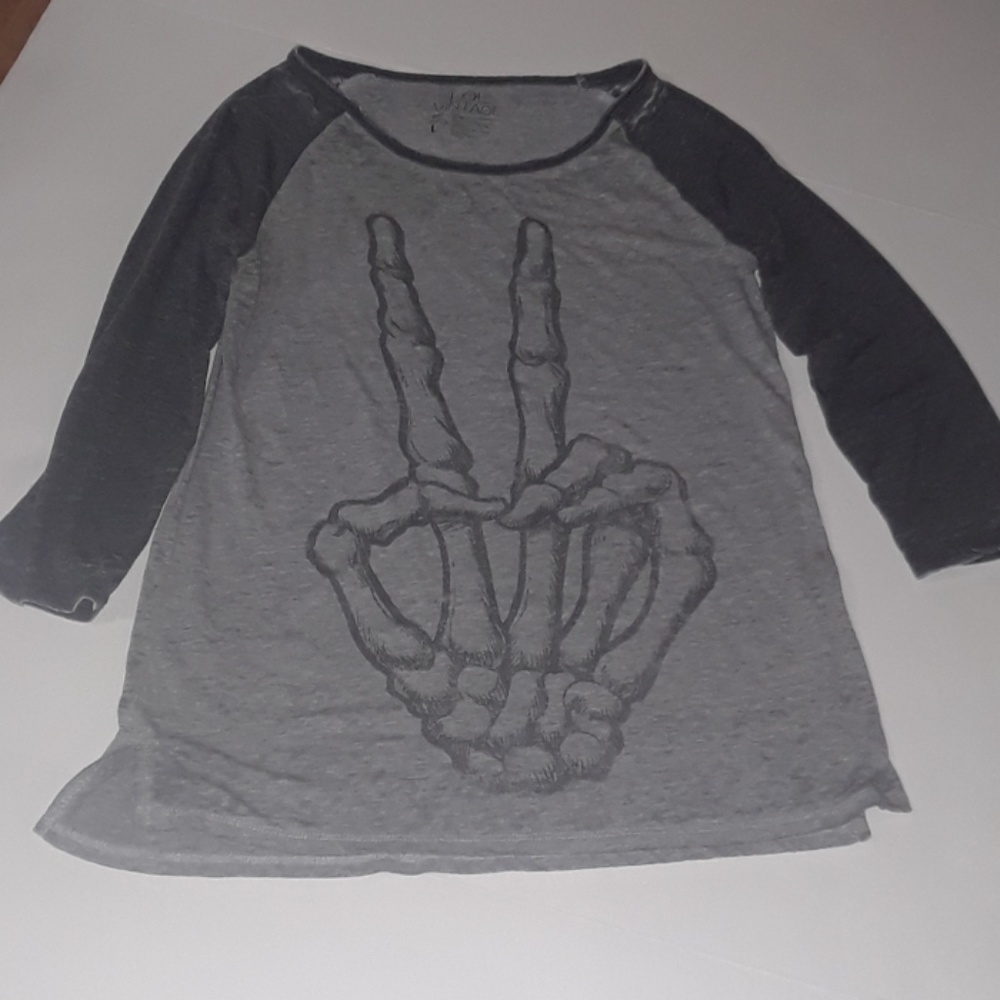 L.O.L VINTAGE skeleton peace sign fingers.